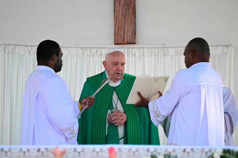 Pope Francis leads holy mass at Sir John Guise Stadium in Port Moresby, Papua New Guinea, on September 8, 2024. Pope Francis is leading holy mass at the Sir Guise Stadium during his four day visit to Papua New Guinea from September 6-9. - AFPPIX