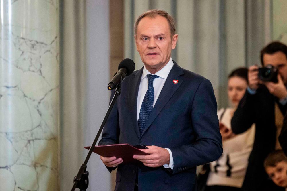 Newly-appointed Polish Prime Minister Donald Tusk delivers a speech during his formal swearing-in ceremony at the Presidential Palace in Warsaw, Poland, on December 13, 2023/AFPPix