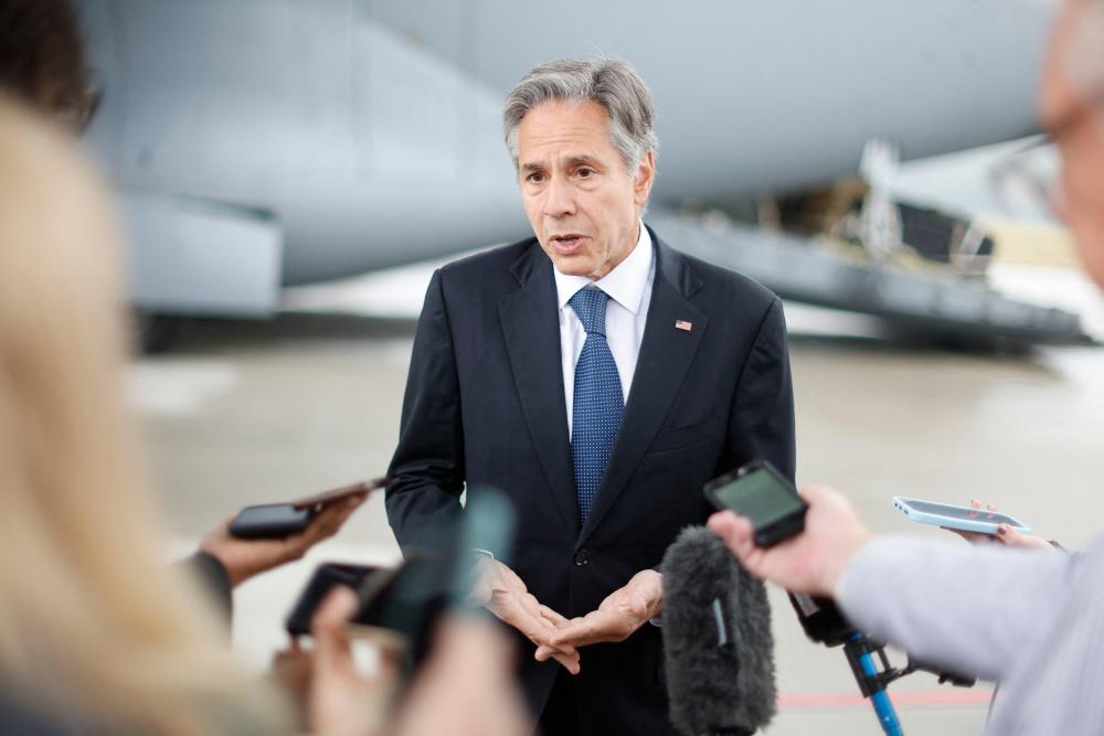 U.S. Secretary of State Antony Blinken speaks with journalist prior to board a plane to travel to Brussels ahead of a meeting with NATO counterparts, a day after his unannounced visit to Ukraine, at Rzeszow-Jasionka Airport in Jasionka, eastern Poland on September 9, 2022. AFPPIX