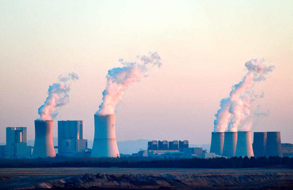 File photo: The opencast lignite mine Nochten and the coal-fired power Boxberg Power Station, operated by Lausitz Energie Bergbau AG (LEAG) company, is pictured in Nochten, Germany, March 22, 2022. REUTERSpix