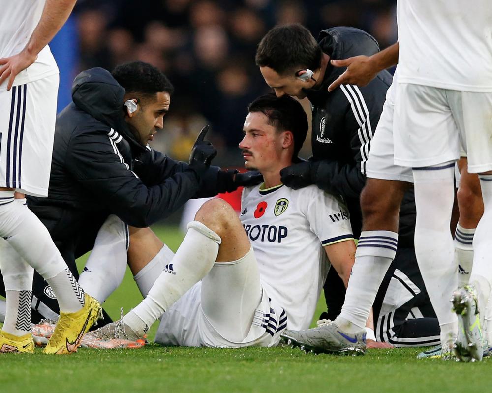 Leeds United's Robin Koch receives medical attention for concussion after sustaining a head injury REUTERSPIX