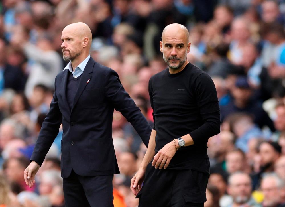 Manchester United manager Erik ten Hag and Manchester City manager Pep Guardiola after the match. - REUTERSPIX