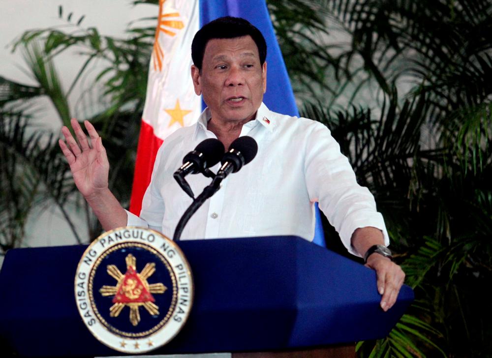 President Rodrigo Duterte speaks after his arrival, from a visit in Israel and Jordan at Davao International airport in Davao City in southern Philippines, Sept 8, 2018. - Reuters