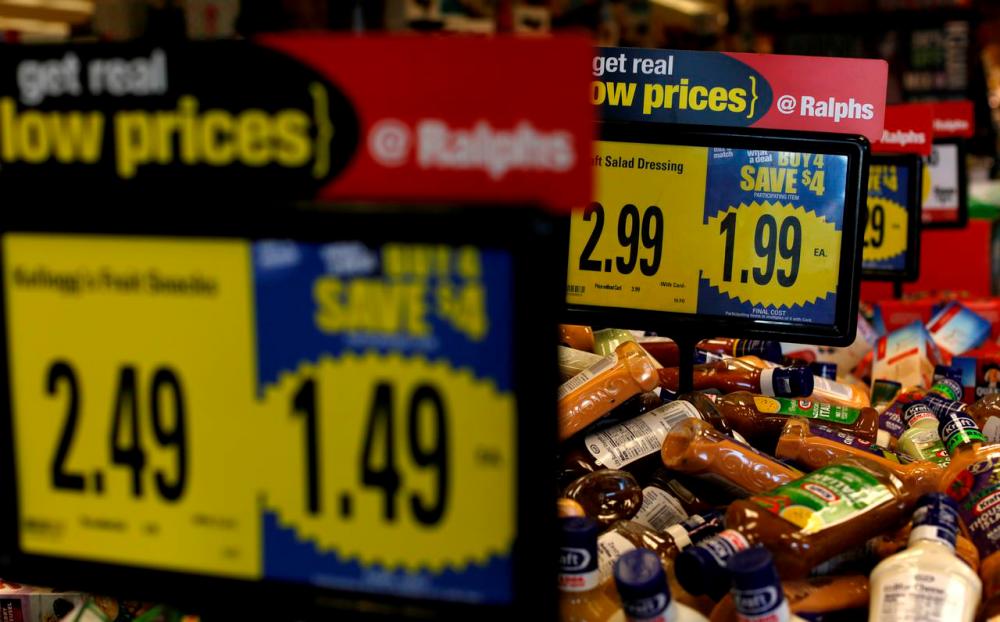 Price tags in a grocery store in California. There is little scope for inflation to heat up as the US economy continues to take a hit from the Covid-19 pandemic. – REUTERSPIX