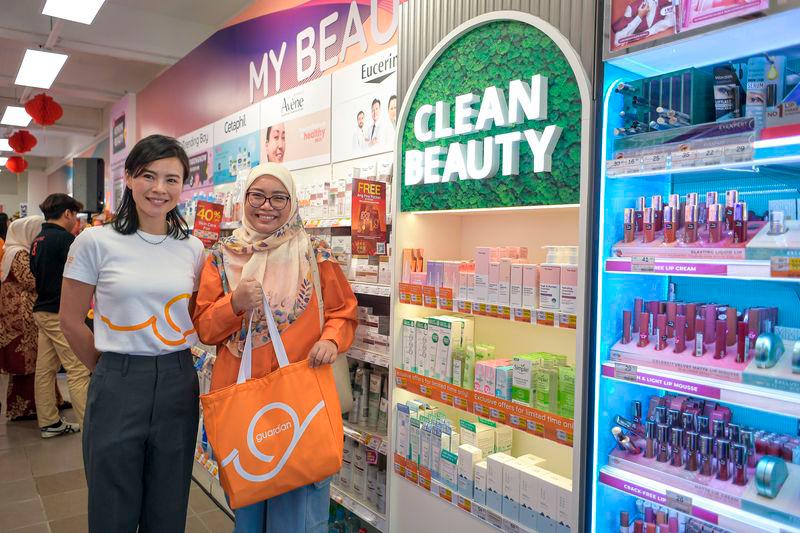 $!Priscilla showing a shopper the new Clean Beauty section