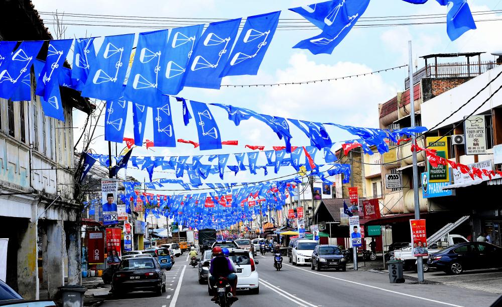 In conjunction with the polling day for the Rantau by-election tomorrow, the town is filled with hundreds of flags and posters of candidates who will be contesting during a survey by Bernama on April 12, 2019. — Bernama
