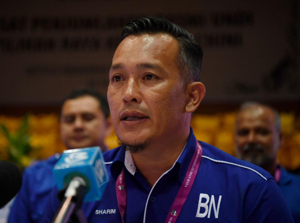 Barisan Nasional candidate Mohd Sharim Md Zain during a press conference after won the Chini state by-election at the official polling centre at Institut Kemahiran Belia Negara Pekan, yesterday. — Bernama
