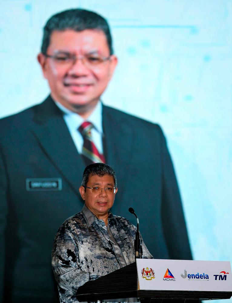 Communications and Multimedia Minister Datuk Saifuddin Abdullah delivering his speech at the launch of Gerbang Sabah, which was officiated by Prime Minister Tan Sri Muhyiddin Yassin last night. — Bernama