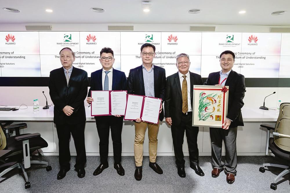 From left: Rand Development adviser Prof Dr Albert Chen Yong Quan, Marcus, Huawei Cloud Malaysia vice-president Lim Chee Siong, Rand Development chairman Harald Chia Khin Chow, and Huawei Cloud director Roy Hu Hai Hua at the signing ceremony.