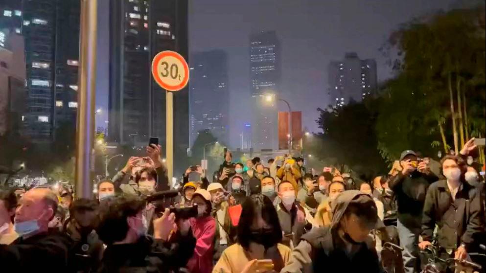 Protesters chant slogans in support of freedom of speech and the press, amid broader nationwide unrest due to Covid-19 lockdown policies, in Chengdu, China in this still image obtained from undated social media video released November 27, 2022. REUTERSPIX