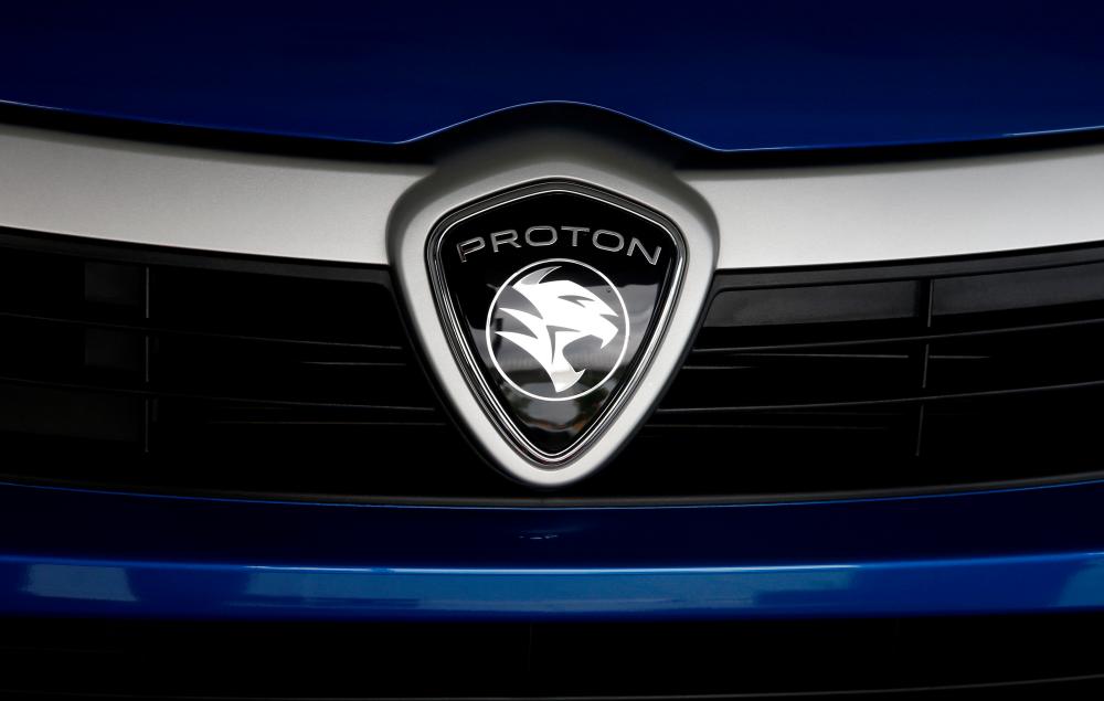 A Proton logo on a car at a Proton showroom in Puchong, Oct 3, 2016. — Reuters