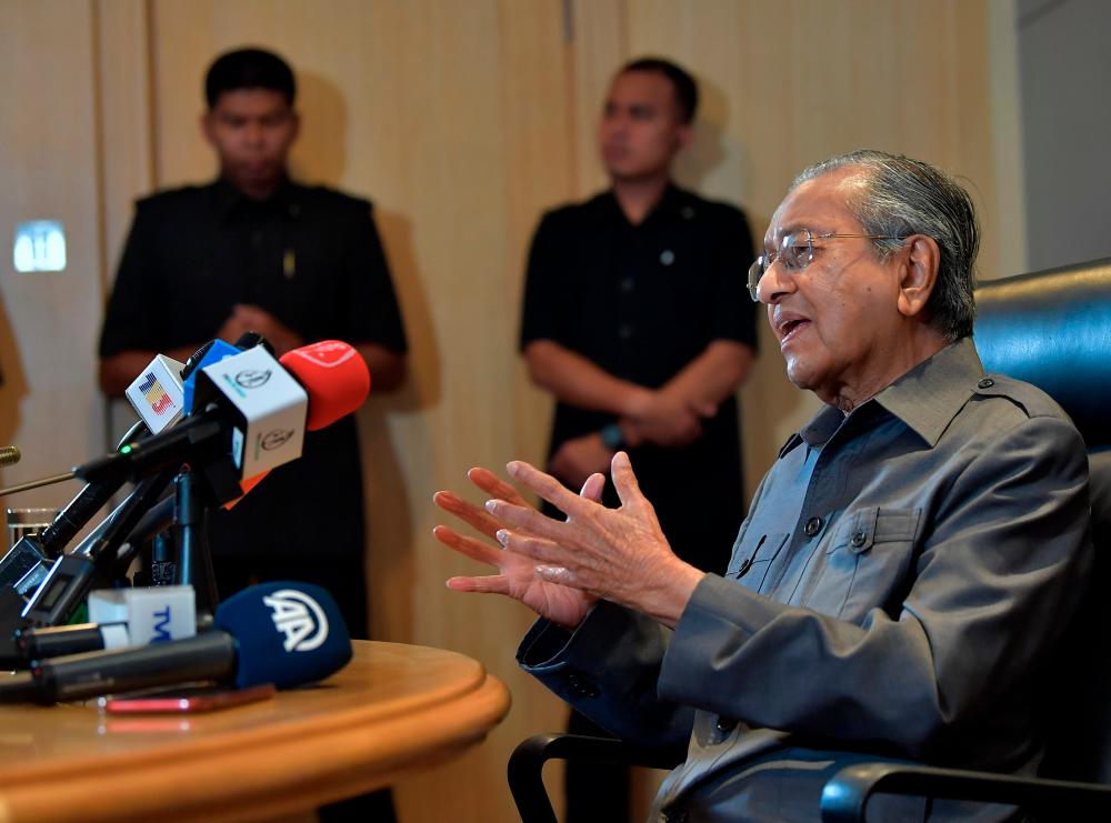 Prime Minister Tun Dr Mahathir Mohamad speaks to the media in Putrajaya on the proposed Kuala Lumpur Summit to be held in December and other topics.  - Bernama
