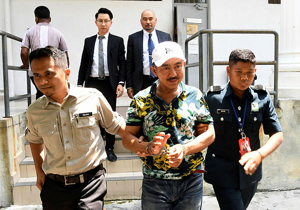 Indonesian citizen Patrum, 51, was arraigned in the Sepang sessions court today for trying to smuggle 23 white-rumped shama birds, a protected species. — Bernama
