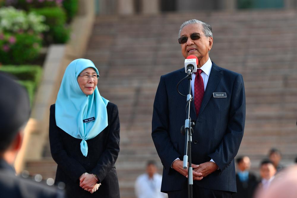 Prime Minister Tun Dr Mahathir Mohamad delivers a speech to the Prime Minister’s Department on May 6, 2019. Also present was Deputy Prime Minister Datuk Seri Dr Wan Azizah Wan Ismail. - Bernama
