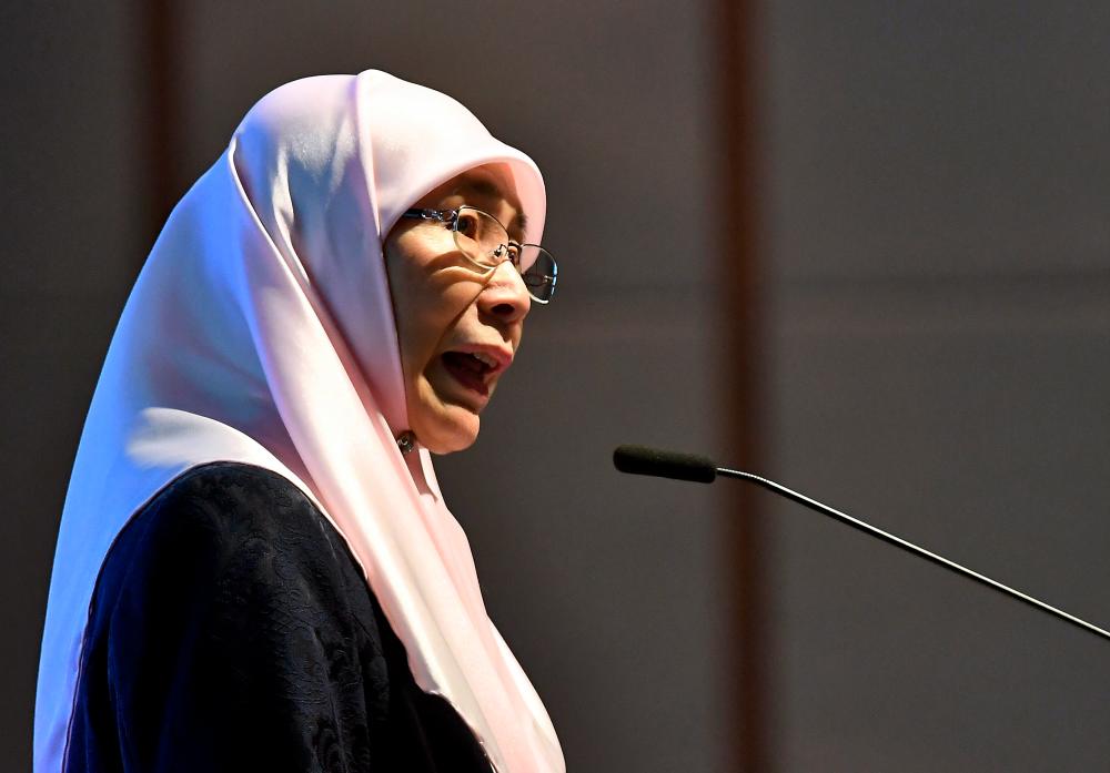 Deputy Prime Minister Datuk Seri Dr Wan Azizah Wan Ismail speaks during the opening of the Gender Mainstreaming and Women Empowerment to Fight Corruption Symposium today. - Bernama