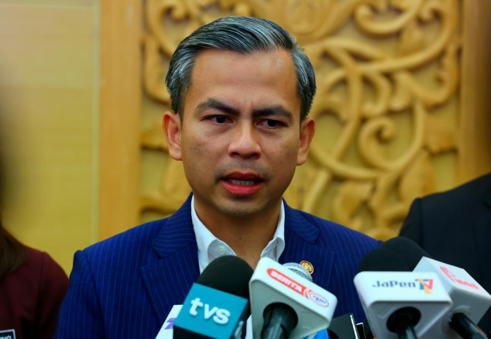 PUTRAJAYA, 16 Dec -- Minister of Communications and Digital Fahmi Fadzil answered media inquiries after attending the New Year 2023 Mandate Ceremony of the Minister of Communications and Digital at the Ministry of Communications and Digital (KKD) today. BERNAMAPIX