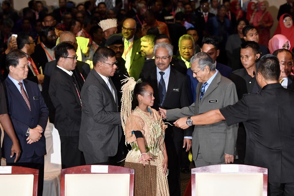 Prime Minister Tun Dr Mahathir Mohamad officiates the inaugural National Aboriginal Convention 2019 at the Putrajaya International Convention Centre, on April 22, 2019. — Bernama