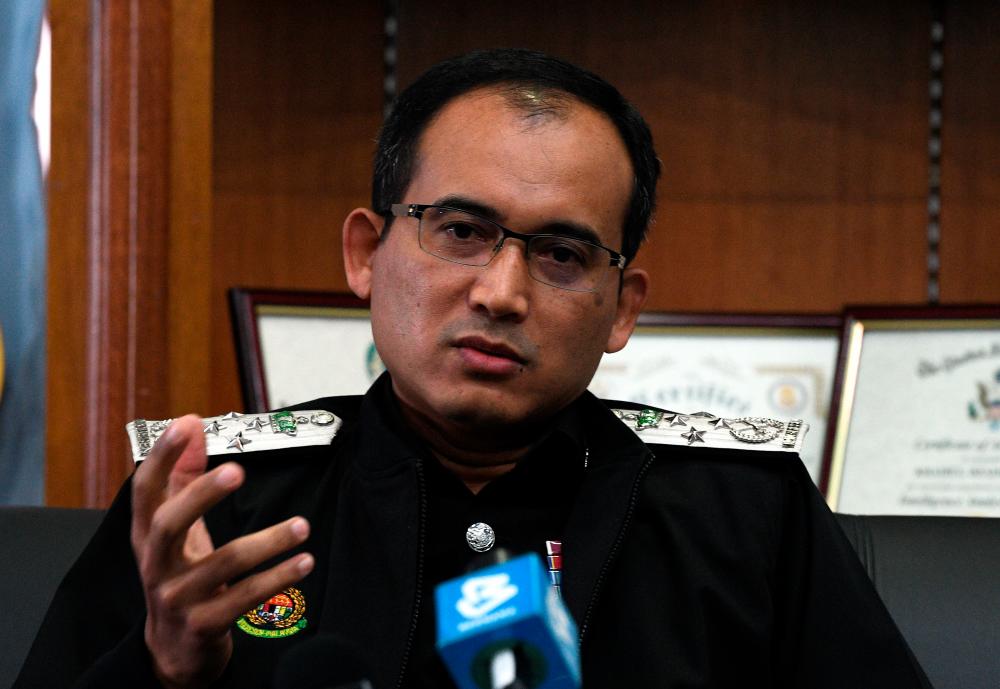 Immigration director-general Datuk Khairul Dzaimee Daud at a press conference on the MCO, in his office today. - Bernama