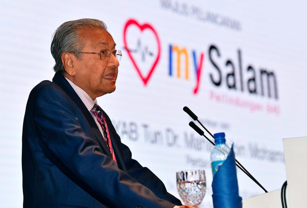 Prime Minister Tun Dr Mahathir Mohamad during the launch of mySalam, on Jan 24, 2019. — Bernama