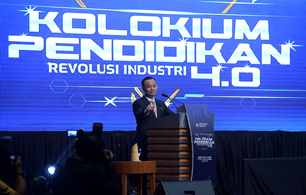 Education Minister Dr Maszlee Malik speaking at the launch of the Industrial Revolution 4.0 (IR 4.0) Education Colloquium in Putrajaya, today. — Bernama