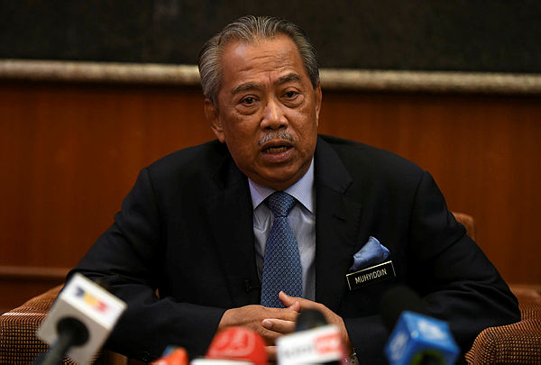 Home Minister Tan Sri Muhyiddin Yassin speaking during a press conference after attending the home ministry’s monthly assembly today. — Bernama