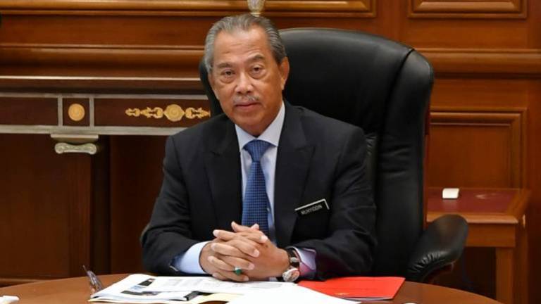 Muhyiddin holds first PM Department’s staff meeting since MCO