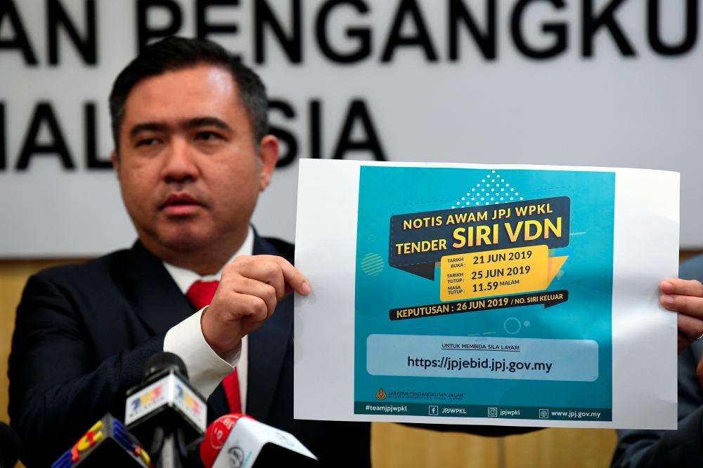 Transport Minister Anthony Loke Siew Fook announces the implementation of JPJeBid to the Kuala Lumpur RTD during a press conference at the Transport Ministry. — Bernama