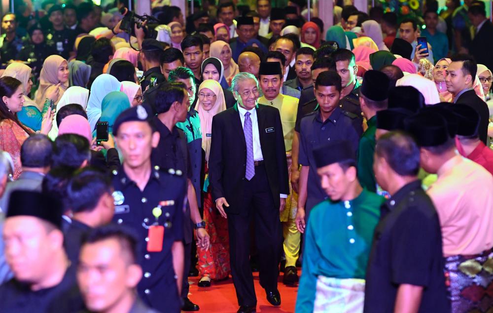 Prime Minister Tun Dr Mahathir Mohamad and Deputy Prime Minister Datuk Seri Dr Wan Azizah Wan Ismail attend the Hari Raya Aidilfitri celebration of the Prime Minister’s Department today. - Bernama