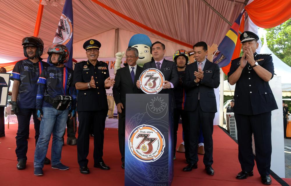 Transport Minister Anthony Loke Siew Fook (4R) officiates the 73rd Road Transport Day (RTD) Day Celebration, on April 15, 2019. — Bernama