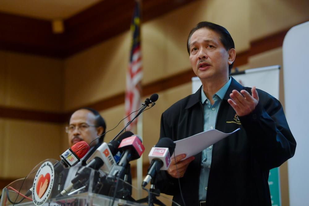 Health director-general Datuk Dr Noor Hisham Abdullah (R) during the daily press conference on Covid-19 at the Ministry of Health today. - Bernama