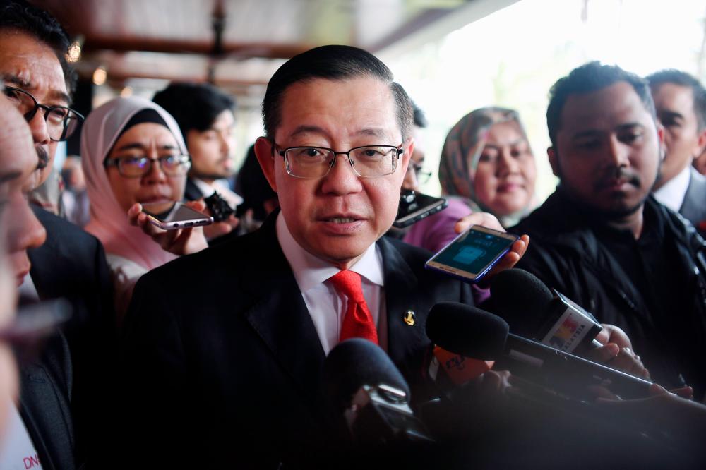 Finance Minister Lim Guan Eng speaks to reporters after officiating the 60th Pan-Asian e-Commerce Alliance Steering Committee Meeting in Cyberjaya today. - Bernama