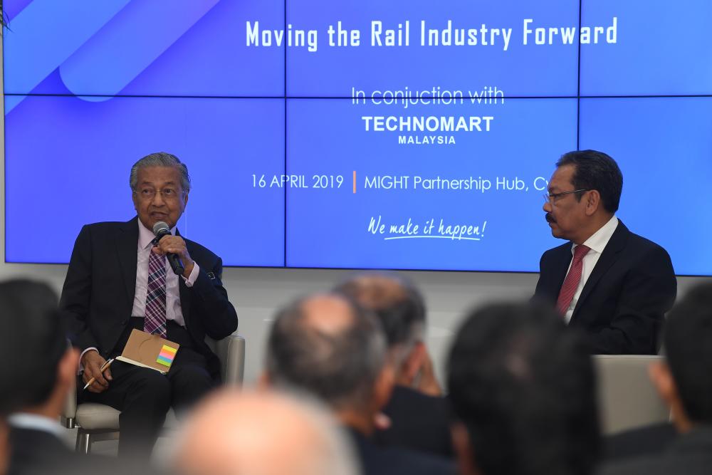 Prime Minister Tun Dr Mahathir Mohamad speaks during a dialogue session at the opening of the Technology Showcase and Technology Showcase and the Largest Domestic Rail Engineering Innovation (TECHNOMART REL 2019) at the High-Tech Industry-Group Cooperation Group (MIGHT), on April 16, 2019. — Bernama