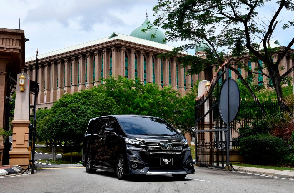 Science, Technology and Innovation Minister Khairy Jamaluddin’s car leaving Perdana Putra earlier today - Bernama