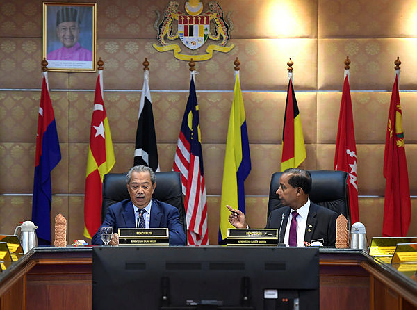 Home Minister Tan Sri Muhyiddin Yassin and Human Resources Minister M. Kula Segaran chair a joint committee comprising both their respective committees on the topic of foreign worker management. — Bernama