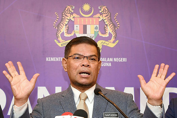 Filepix taken on July 2 shows Domestic Trade and Consumer Affairs minister Datuk Seri Saifuddin Nasution Ismail speaking at his ministry in Putrajaya. — Bernama