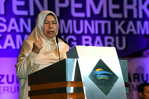 Housing and Local Government Minister Zuraida Kamaruddin delivers a speech at the opening of the Kampung Baru Village Community Management Council Empowerment Convention at the Putrajaya International Convention Centre on April 28, 2019. — Bernama