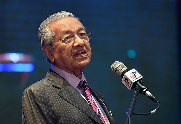 Filepix taken on Aug 13 shows Prime Minister Tun Dr Mahathir Mohamad speaking at the Education Ministry in Putrajaya.