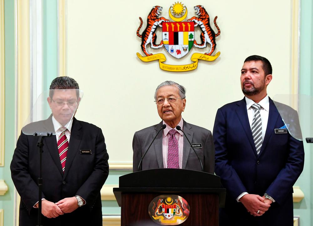 From left: Foreign Minister Datuk Saifuddin Abdullah, Prime Minister Tun Dr Mahathir Mohamad, and Deputy Foreign Minister Datuk Marzuki Yahya, at the launch of the Foreign Policy Framework of the New Malaysia, on Spet 18, 2019. — Bernama