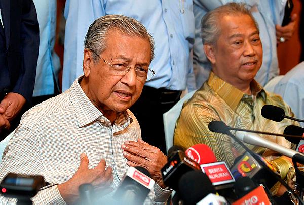 Filepix: Tun Dr Mahathir Mohamad (left) and Tan Sri Muhyiddin Yassin (right)/BERNAMAPix