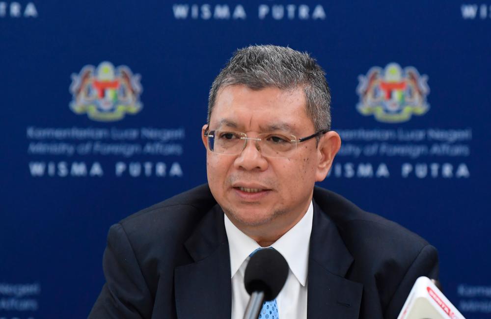 Foreign Minister Datuk Saifuddin Abdullah speaks in a press conference held after the signing ceremony of a memorandum of understanding between Wisma Putra and UiTM in Putrajaya today. - Bernama