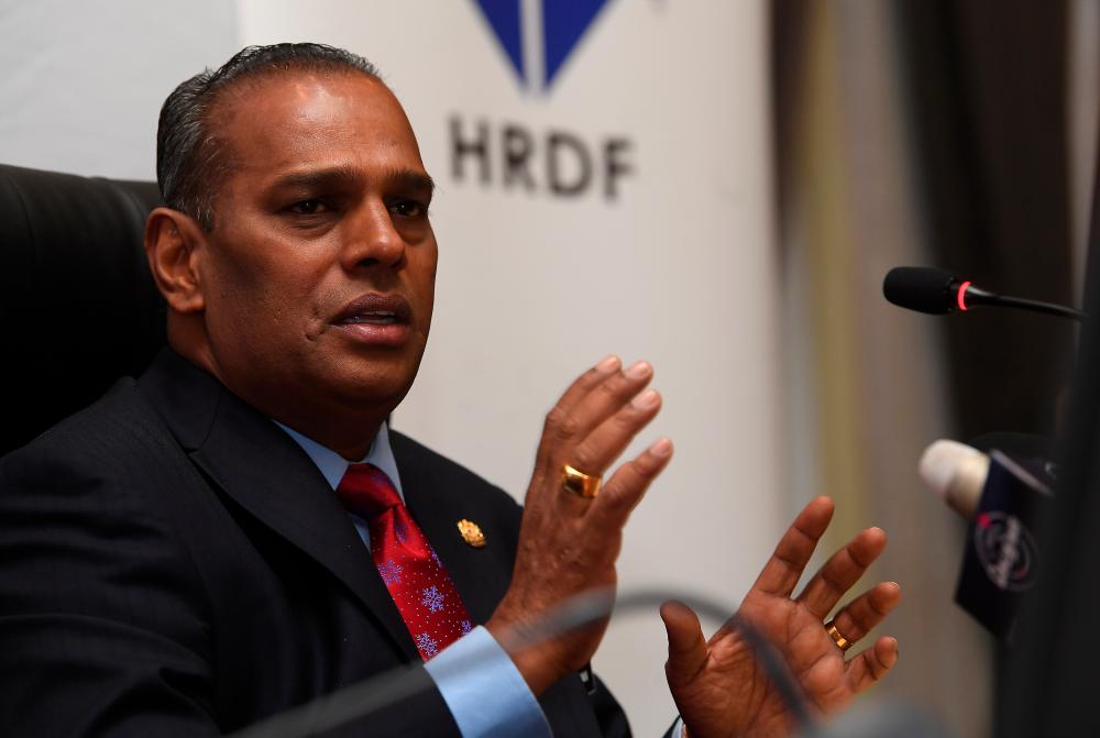 Human Resources Minister Datuk Seri M. Saravanan speaks during a press conference after launching the HRDF initiative under the National Economic Recovery Plan (Penjana), at the Human Resources Ministry today. - Bernama