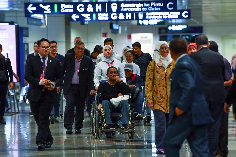 The six PKNS employees who were injured in a bus accident in Afyonkarahisar, Turkey arrived at KLIA on the night of October 22, 2019. - Bernama