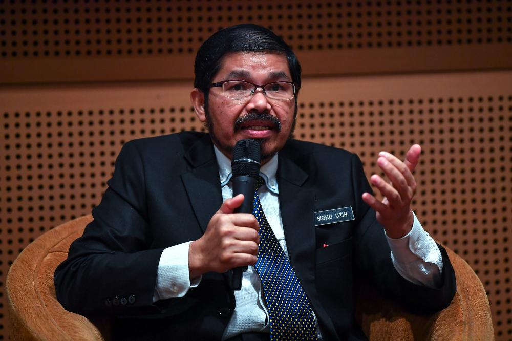 Chief Statistician Datuk Seri Dr Mohd Uzir Mahidin during a press conference after the Malaysian Population and Housing Census 2020 launching ceremony at the Putrajaya International Convention Centre today. - Bernama