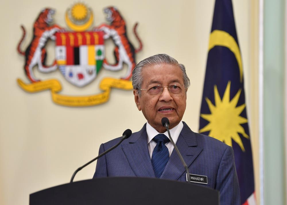 Prime Minister Tun Dr Mahathir Mohamad speaks during a press conference in conjunction with the Ninth Malaysia-Singapore Leadership Retreat at the Perdana Putra building, on April 9, 2019. — Bernama