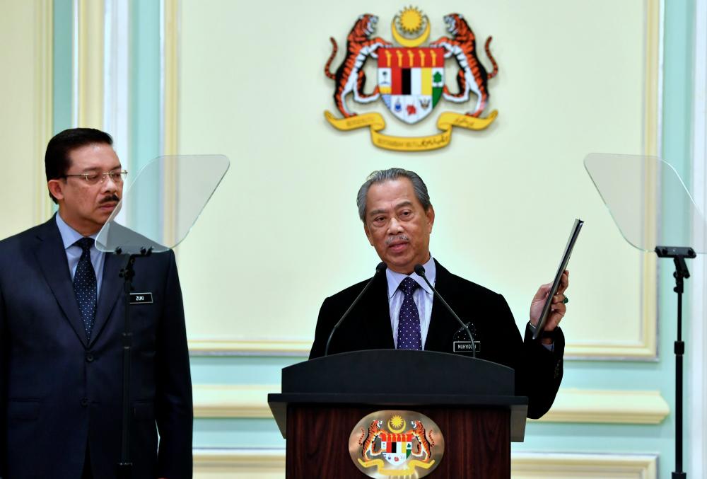 Prime Minister Tan Sri Muhyiddin Yassin announces the Cabinet appointments for his government at the Perdana Putra today. - Bernama