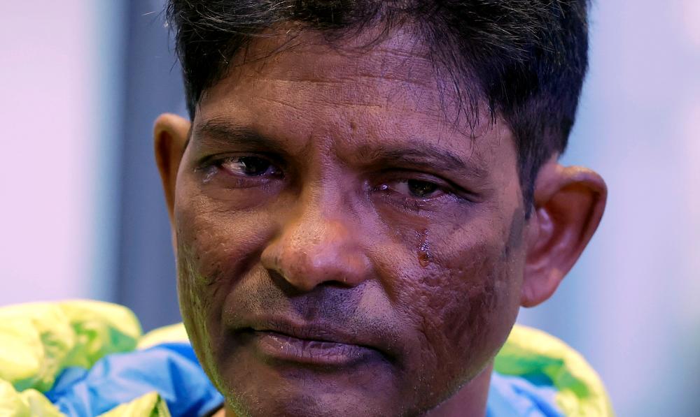 SEPANG, May 21 -- National solo climber who is also a Disabled Person (OKU), T. Ravichandran, 58, spoke to reporters after arriving at Kuala Lumpur International Airport (KLIA) today. BERNAMAPIX