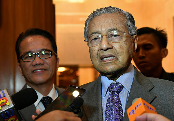Prime Minister Tun Dr Mahathir Mohamad is interviewed after chairing the Special Cabinet Committee (Steering Committee) to Review the Malaysia Agreement 1963 (MA63) at Putrajaya on March 5, 2019. — Bernama