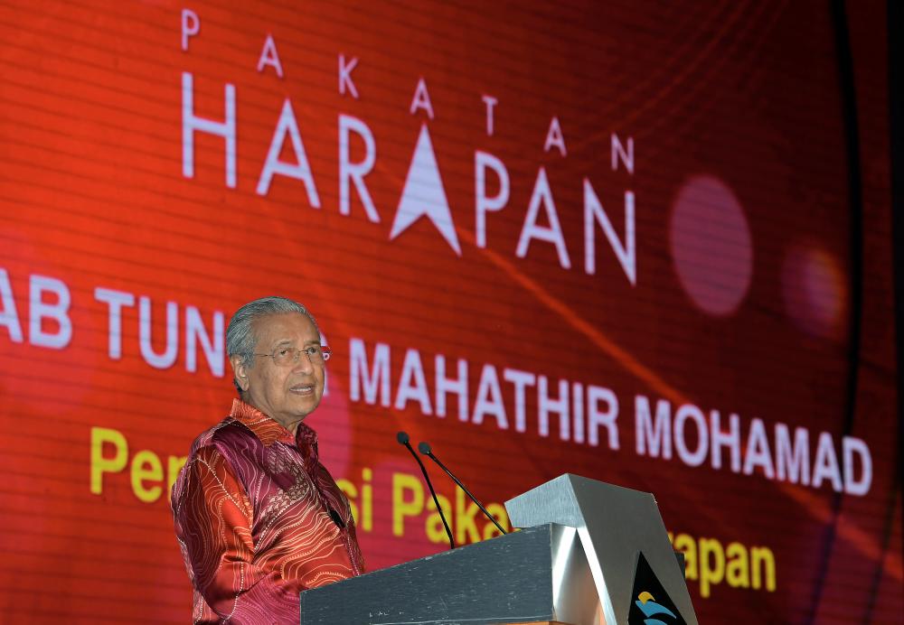 Prime Minister Tun Dr Mahathir Mohamad, chairman of the Pakatan Harapan speaks at the Putrajaya International Convention Center (PICC) here, on Dec 9, 2018. — Bernama