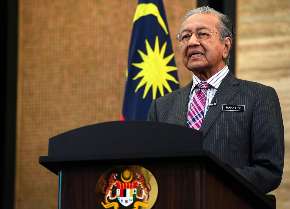 Prime Minister Tun Dr Mahathir Mohamad gives a speech in conjunction with tommorow’s National Day celebrations, at the Prime Minister's Office today. - Bernama
