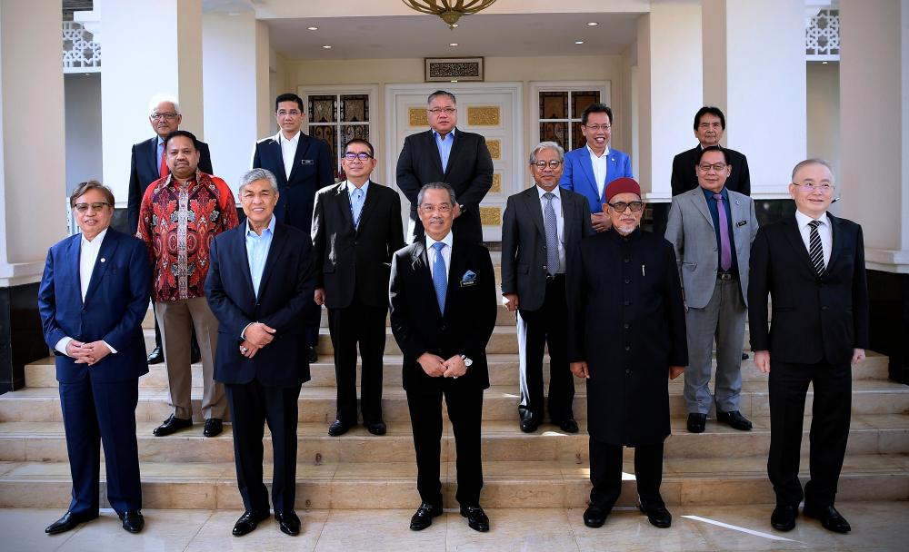 PN party chiefs take a group photo after a meeting in Putrajaya today. - Bernama